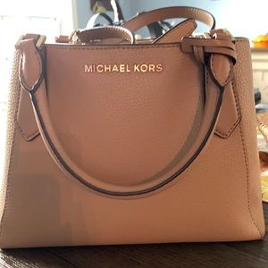 Woman’s Michael Kors bag